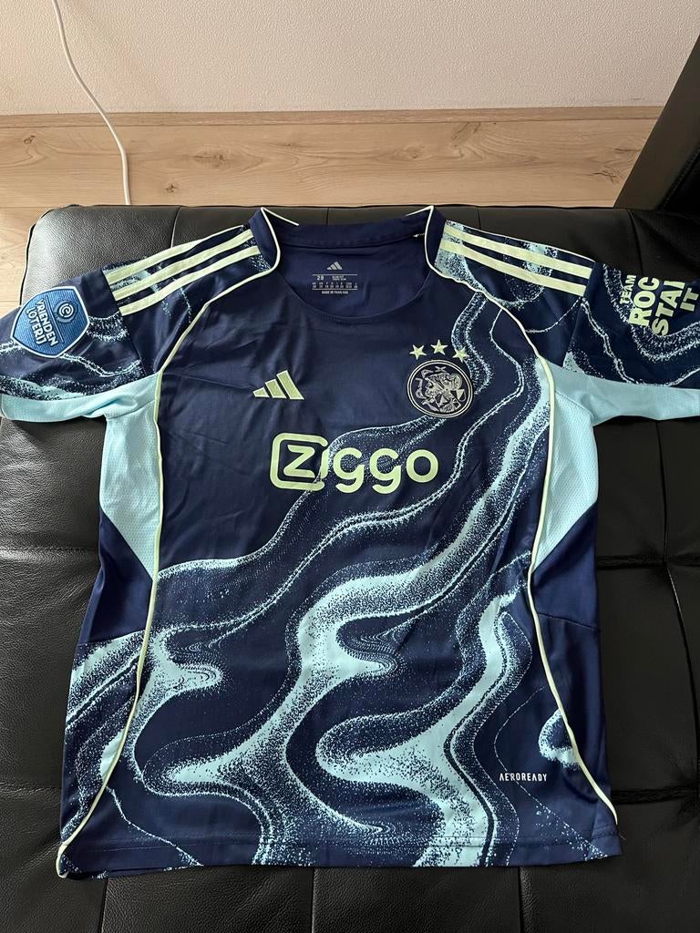 Ajax-uitshirt Junior 2025-2026 Maat 158, Kinderen en Baby's, Kinderkleding | Overige, Ophalen, Nieuw, Jongen of Meisje