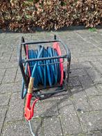 Slanghaspel compressor, Ophalen