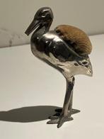 Haags ooievaartje speldekussen, Ophalen