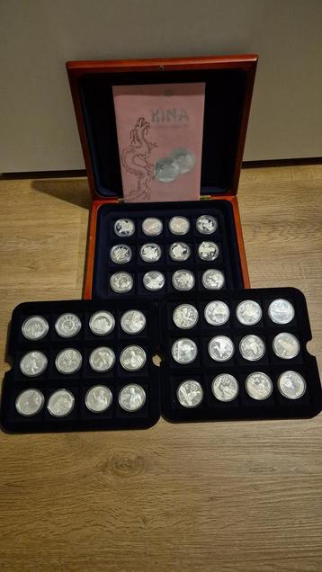 Zilveren Chinese Munten Collectie 36 stuks beschikbaar voor biedingen