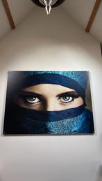 Schilderij ogen van een vrouw, Ophalen