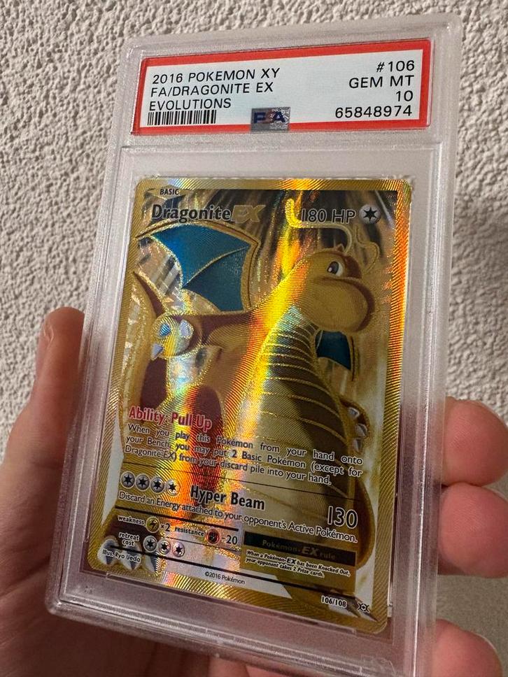 PSA 10 - Dragonite 106 EX - Pokémonkaart (Evolutions), Hobby en Vrije tijd, Verzamelkaartspellen | Pokémon, Zo goed als nieuw