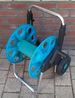 Tuinslang haspel, Ophalen, Tuinslanghaspel