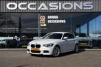 BMW 1-serie 114i Business+ NAVIGATIE/ LEDER/ LM 17/ PDC, Auto's, BMW, 1-Serie, Achterwielaandrijving, Gebruikt, Zwart