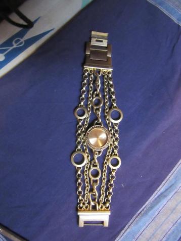 dames horloge goudkleurig beschikbaar voor biedingen