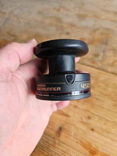 1 Shimano 4500 baitrunner 1ste model spoel, Watersport en Boten, Hengelsport | Karpervissen, Gebruikt, Molen, Ophalen of Verzenden