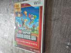 New super mario bros wii krasvrij met boekje en doosje, Ophalen of Verzenden, Zo goed als nieuw, Platform, 3 spelers of meer