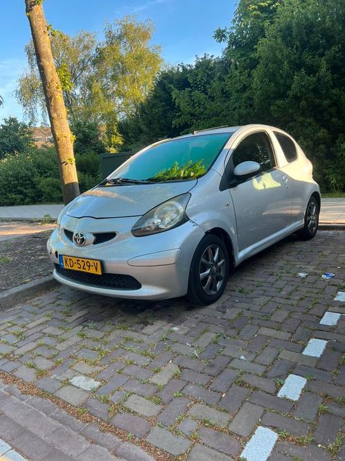 Toyota Aygo 1.0 12V Vvt-i 3DRS MMT 2006 Grijs, Auto's, Toyota, Particulier, Aygo, ABS, Airbags, Airconditioning, Centrale vergrendeling