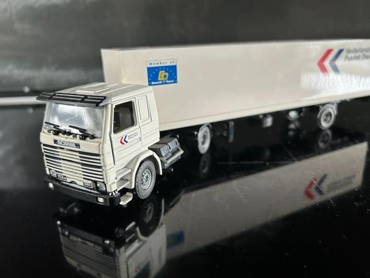 Tekno Scania 113m firma NPD met 1 assige oplegger, Hobby en Vrije tijd, Modelauto's | 1:50, Zo goed als nieuw, Bus of Vrachtwagen