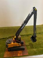 Volvo EC220E LR met kantelbak, Hobby en Vrije tijd, Modelauto's | 1:32, Ophalen, Nieuw, Tractor of Landbouw, Overige merken