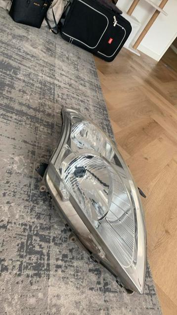 suzukie Swift rechter koplamp bouwjaar 2009 beschikbaar voor biedingen