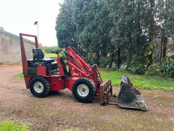 Fuchs F853 Kniklader (Pallet lepels + Grondbak) beschikbaar voor biedingen