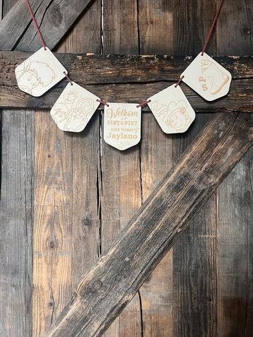 Houten slinger gepersonaliseerd met naam beschikbaar voor biedingen