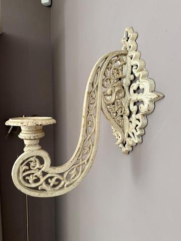 Gietijzeren wandkandelaars  beschikbaar voor biedingen