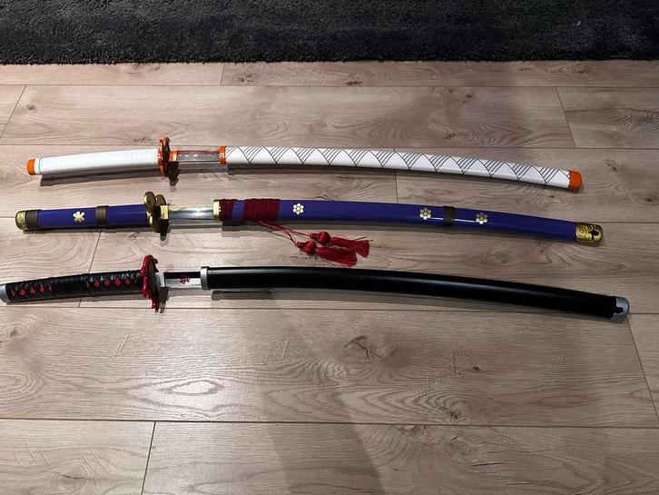 One Piece & Demon Slayer Zwaarden Collectie, Verzamelen, Militaria | Algemeen, Overige soorten, Zwaard of Sabel, Azië, Ophalen of Verzenden