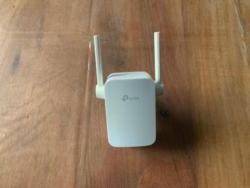 (9)  TP-Link (Model TL-WA855RE)  WiFi-versterker  De TP-Link beschikbaar voor biedingen