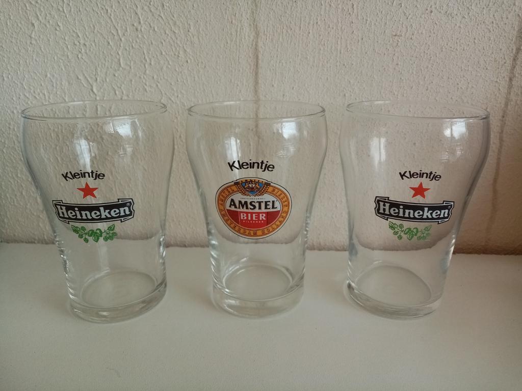 4 Heineken en 1 Amstel kleintje bierglazen, Verzamelen, Ophalen of Verzenden, Nieuw, Glas of Glazen, Heineken