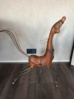 Houten paard, Ophalen