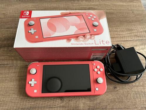 Nintendo Switch Lite Coral, Spelcomputers en Games, Spelcomputers | Nintendo Switch Lite, Zo goed als nieuw, Roze of Coral, Ophalen