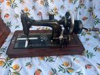 Antieke Electra naaimachine, Ophalen