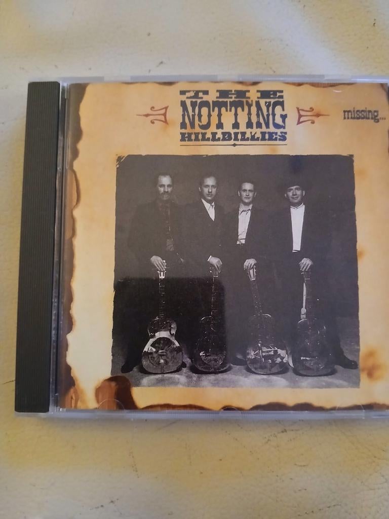 CD The Notting Hillbillies - Missing...Presumed Having A Goo, Cd's en Dvd's, Ophalen of Verzenden, Zo goed als nieuw