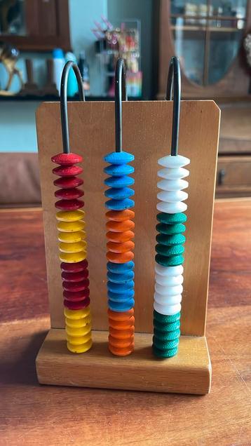 Rekenrek / Abacus met 60 platte kunststof kralen in  beschikbaar voor biedingen