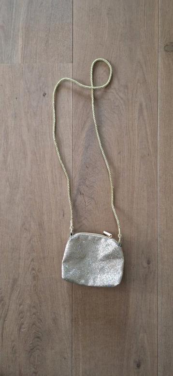 Tasje gouden glitter  beschikbaar voor biedingen