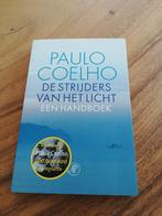 Paulo Coelho - De strijders van het licht, Boeken, Ophalen of Verzenden, Zo goed als nieuw, Paulo Coelho