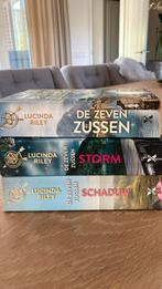 Lucinda Riley - De zeven zussen - Storm - Schaduw, Boeken, Lucinda Riley, Ophalen of Verzenden, Zo goed als nieuw, Nederland