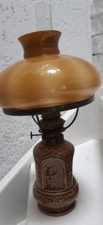 Olie lamp, Ophalen