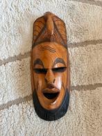 Handgebeitst houten masker uit Senegal, Ophalen