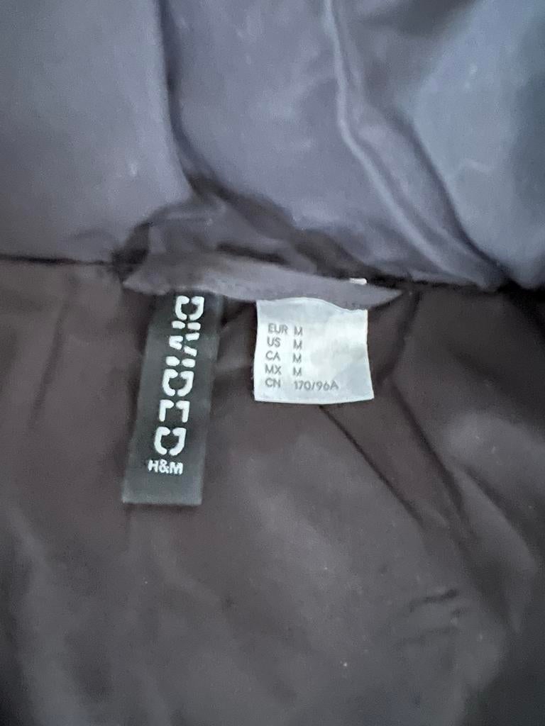 Zwarte H&M Divided Puffer Jas Maat M, Ophalen of Verzenden, Zo goed als nieuw, Maat 38/40 (M), Zwart
