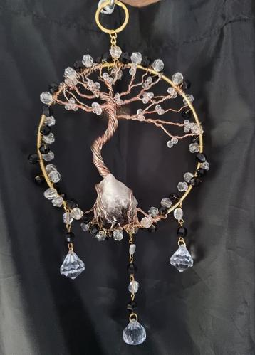 Handgemaakte suncatcher met rookkwarts in de roots. beschikbaar voor biedingen