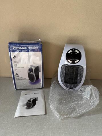 PORTABLE HEATER voor in het stopcontact NIEUW in doos beschikbaar voor biedingen