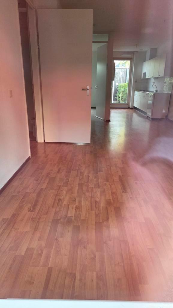Gratis! 25/26e/27e Warm bruin laminaat vloer circa 40m, Doe-het-zelf en Verbouw, Vloerdelen en Plavuizen, Zo goed als nieuw, Laminaat