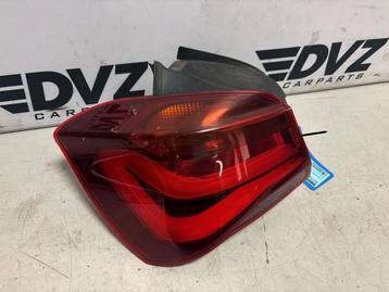 Achterlicht links van een BMW 1-Serie beschikbaar voor biedingen