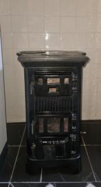 Antieke houtkachel, Ophalen
