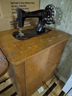 Naaimachine kast, Ophalen
