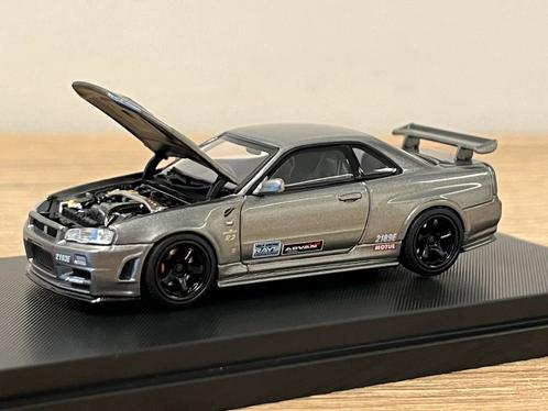 Nissan Skyline GT-R R34 NISMO Crs Gun w/livery motorhelix, Hobby en Vrije tijd, Modelauto's | Overige schalen, Nieuw, Auto, Ophalen of Verzenden