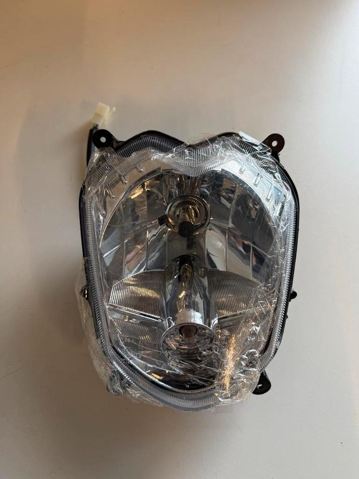 Koplamp Sym Orbit / xpro  Artikelnummer . 80895, Motoren, Tuning en Styling, Ophalen
