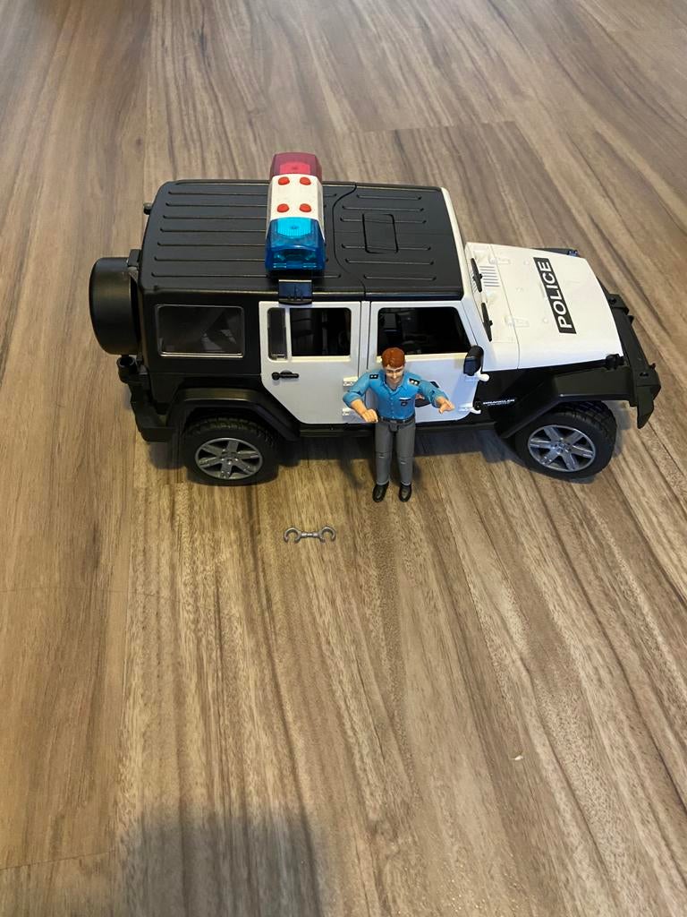 Bruder Jeep Wrangler Unlimited Rubicon - met politieman, Ophalen of Verzenden, Gebruikt, Jongen of Meisje