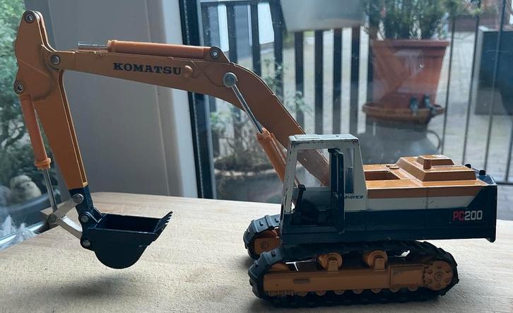 Grote Metalen Graafmachine Tomica pc200 deur kan open, Hobby en Vrije tijd, Modelauto's | Overige schalen, Gebruikt, Tractor of Landbouw