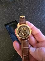 skeleton heren horloge goud, Sieraden, Tassen en Uiterlijk, Horloges | Heren, Ophalen of Verzenden, Zo goed als nieuw, Overige materialen