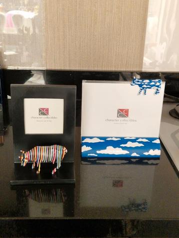 2x Cow Parade Fotolijstjes"Striped Cow"€20.00"Sky Cow"€15.00 beschikbaar voor biedingen