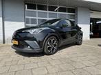 Toyota C-HR 1.8 Hybrid Dynamic | Stoelverwarming | Navigatie, Auto's, Stof, Euro 6, Met garantie (alle), Zwart