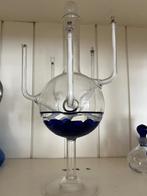 Olielamp laboratoriumglas, Ophalen
