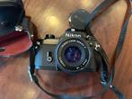 Nikon EM Spiegelreflex Camera met 50mm 1:1.8 Series E lens, Ophalen, Zo goed als nieuw, Spiegelreflex, Nikon