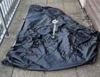 Scooterhoes met windscherm, Ophalen
