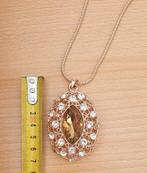 Rosegoudkleurige lange ketting met grote strasshanger, Overige materialen, Nieuw, Ophalen of Verzenden, Goud