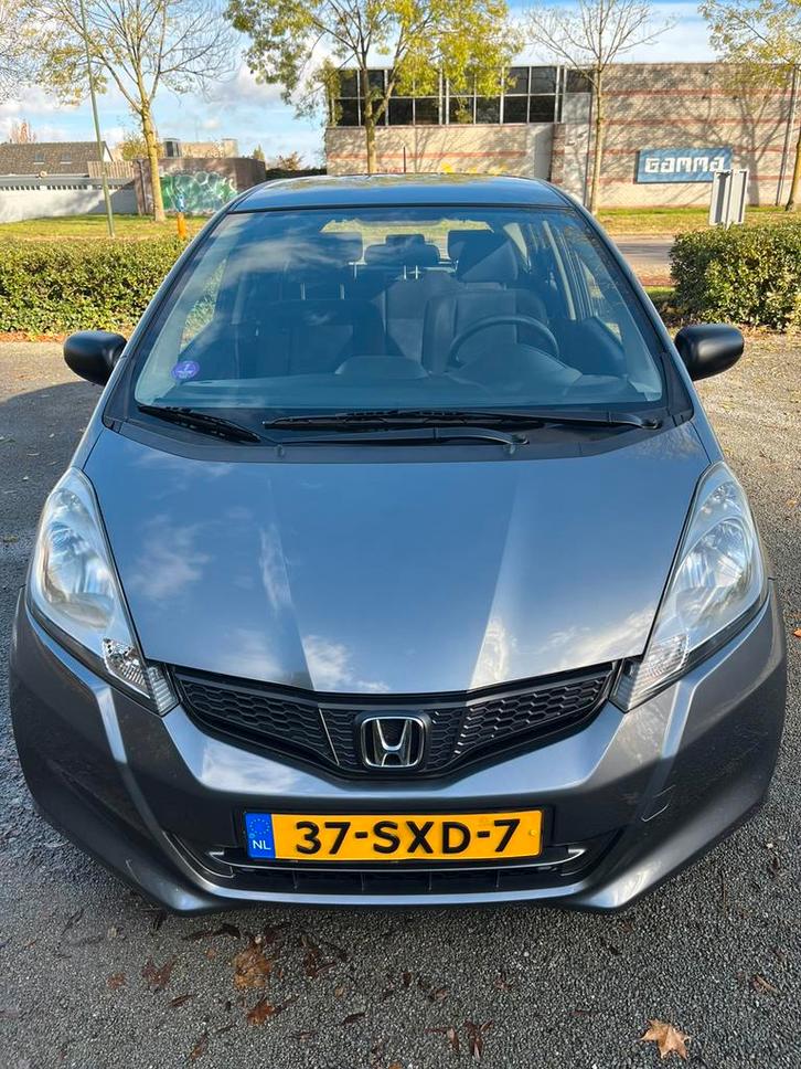 Honda Jazz 1.2 dec. 2011 Grijs nw APK, Auto's, Honda, Particulier, Jazz, ABS, Airbags, Airconditioning, Boordcomputer, Centrale vergrendeling